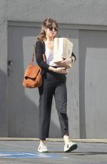 DAKOTA JOHNSON Leaves Book Soup in West Hollywood 04/24/2019