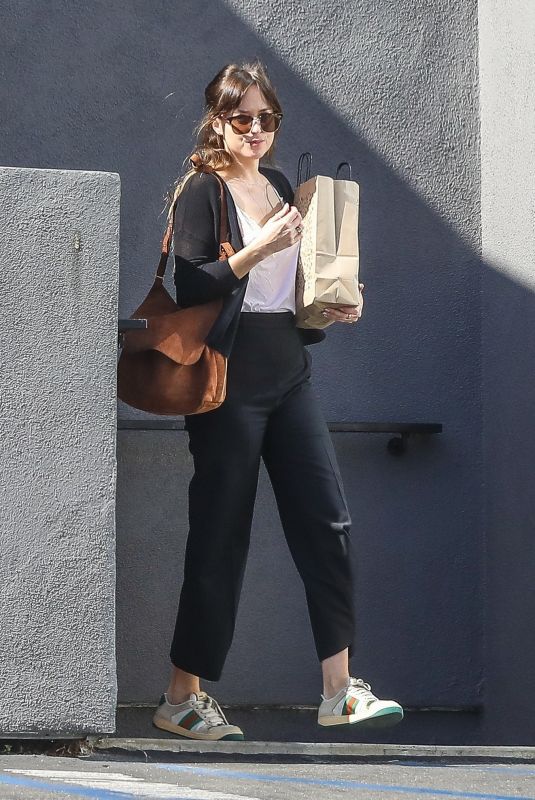 DAKOTA JOHNSON Leaves Book Soup in West Hollywood 04/24/2019