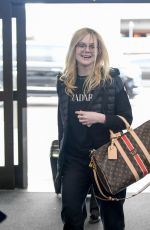 ELLE FANNING at Los Angeles International Airport 04/03/2019