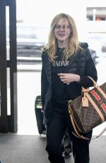 ELLE FANNING at Los Angeles International Airport 04/03/2019