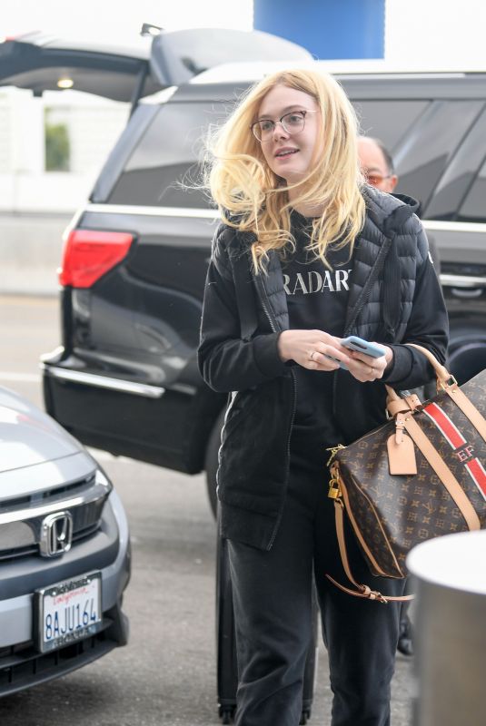 ELLE FANNING at Los Angeles International Airport 04/03/2019