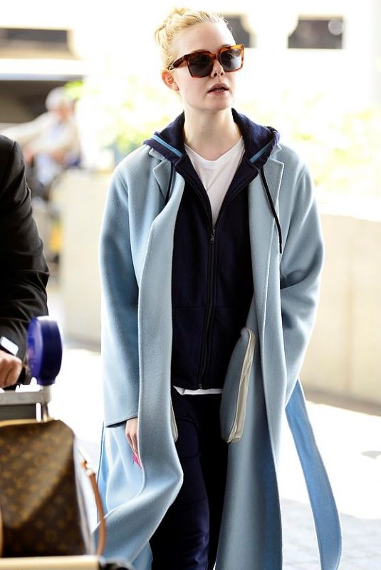 ELLE FANNING at Los Angeles International Airport 04/22/2019