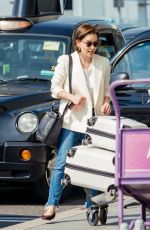 EMILIA CLARKE at Heathrow Airport in London 04/22/2019