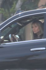 HEIDI KLUM Makeup Free Driving Out in Los Angeles 04/15/2019