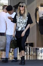 HEIDI KLUM Shopping at a Nike Store in Los Angeles 04/13/2019