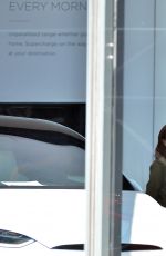 JULIANNE MOORE and Bart Freundlich Out Check New Tesla in New York 04/07/2019