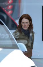 JULIANNE MOORE and Bart Freundlich Out Check New Tesla in New York 04/07/2019