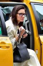 KATIE HOLMES Leaves a Cab in New York 04/18/2019