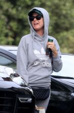 KATY PERRY Arrives at a Friend