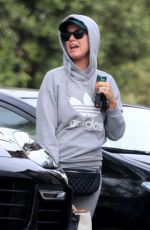 KATY PERRY Arrives at a Friend
