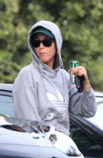 KATY PERRY Arrives at a Friend