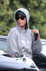 KATY PERRY Arrives at a Friend