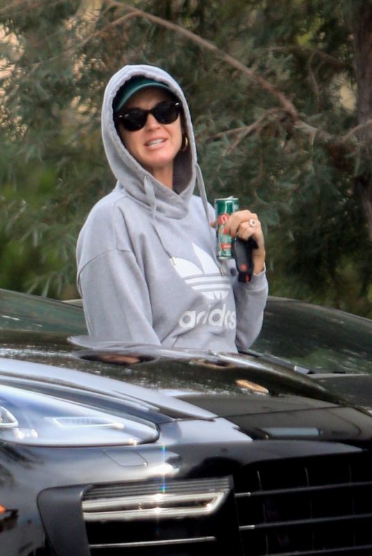 KATY PERRY Arrives at a Friend