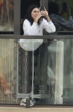 KENDALL JENNER on the Balcony of Her Hotel in Sydney 04/04/2019