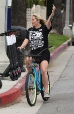 KESHA Riding a Bike Out in Venice Beach 04/29/2019