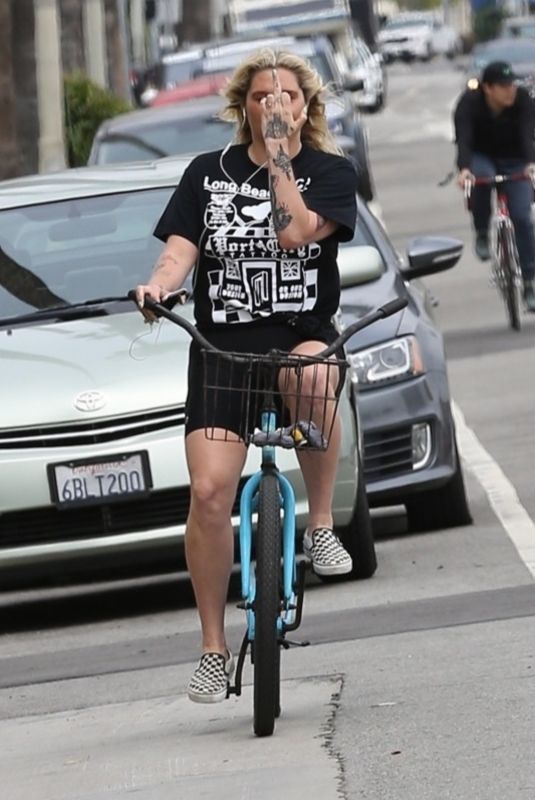 KESHA Riding a Bike Out in Venice Beach 04/29/2019