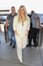 KESHA SEBERT Arrives at LAX Airport in Los Angeles 04/25/2019