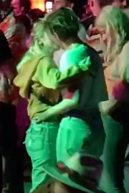 KRISTEN STEWAR and SARA DINKIN Kisses at Coachella in Indio 04/12/2019