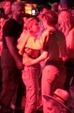 KRISTEN STEWAR and SARA DINKIN Kisses at Coachella in Indio 04/12/2019