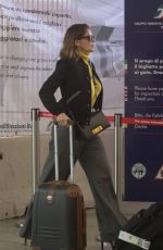 LAETITIA CASTA Leaves Hotel St. Regis in Rome 04/06/2019