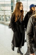 LILY COLLINS at Heathrow Airport in London 04/24/2019