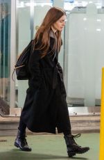 LILY COLLINS at Heathrow Airport in London 04/24/2019