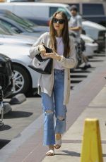 LILY COLLINS Heading to a Spa in Hollywood 04/15/2109