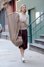 MARTHA HUNT Arrives at Taylor Swift