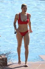 MICHELLE HUNZIKER in Bikini at Lake Garda in Gargnano 03/31/2019