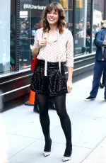 MILLA JOVOVICH Arrives at Build Series in New York 04/08/2019