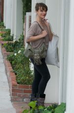 MILLA JOVOVICH Shopping at Isabel Marant in West Hollywood 04/04/2019