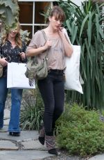 MILLA JOVOVICH Shopping at Isabel Marant in West Hollywood 04/04/2019