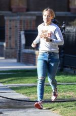 OLIVIA WILDE in Ripped Jeans Out in New York 04/03/2019
