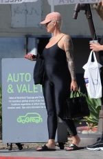 Pregnant AMBER ROSE in Tights at Cheesecake Factory in Los Angeles 04/24/2019