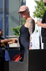 Pregnant AMBER ROSE in Tights at Cheesecake Factory in Los Angeles 04/24/2019