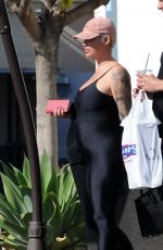 Pregnant AMBER ROSE in Tights at Cheesecake Factory in Los Angeles 04/24/2019