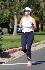 REESE WITHERSPOON Out Jogging in Brentwood 03/31/2019