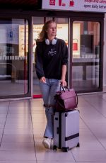 TONI GARRN in Ripped Denim at Berlin Tegel Airport 04/23/2019