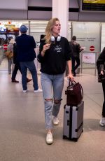 TONI GARRN in Ripped Denim at Berlin Tegel Airport 04/23/2019