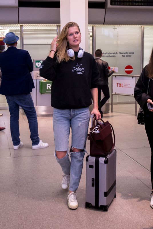 TONI GARRN in Ripped Denim at Berlin Tegel Airport 04/23/2019