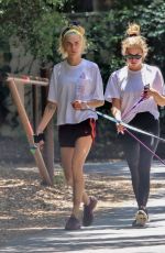 ASHLEY BENSON and CARA DELEVINGNE Out with Their Dogs in Studio City 05/29/2019