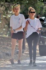 ASHLEY BENSON and CARA DELEVINGNE Out with Their Dogs in Studio City 05/29/2019