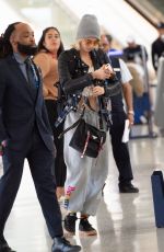 CARA DELEVINGNE and ASHLEY BENSON at JFK Airport in New York 05/08/2019