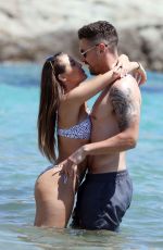 CHLOE GOODMAN in Bikini at a Beach in Mykonos 05/16/2019
