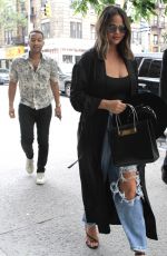 CHRISSY TEIGEN in Ripped Jeans Out and About in New York 05/29/2019
