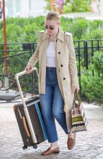 DAKOTA FANNING Leaves Martinez Hotel in Cannes 05/22/2019