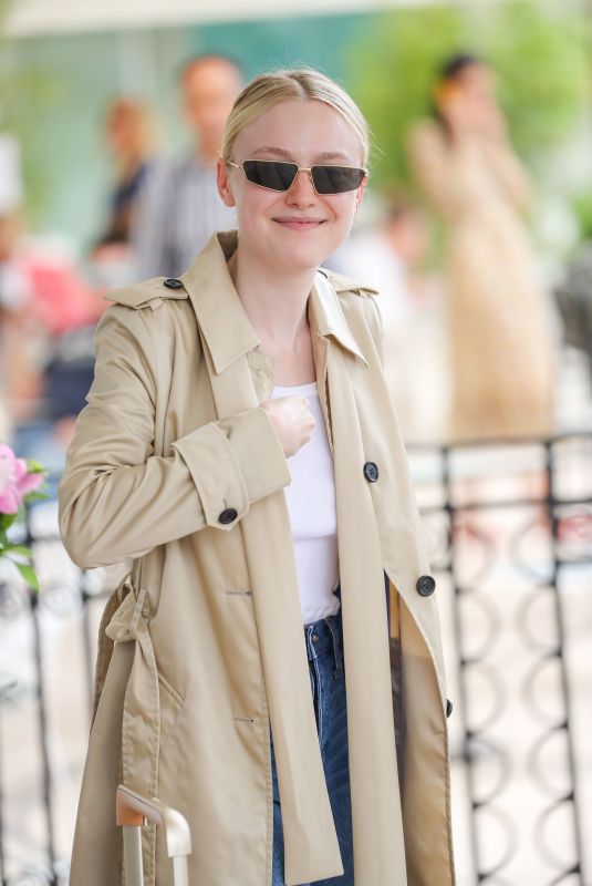 DAKOTA FANNING Leaves Martinez Hotel in Cannes 05/22/2019