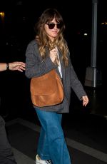 DAKOTA JOHNSON Arrives at Her Hotel in New York 05/05/2019