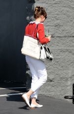 DAKOTA JOHNSON Arrives on the Set of Covers in Hollywood 05/30/2019