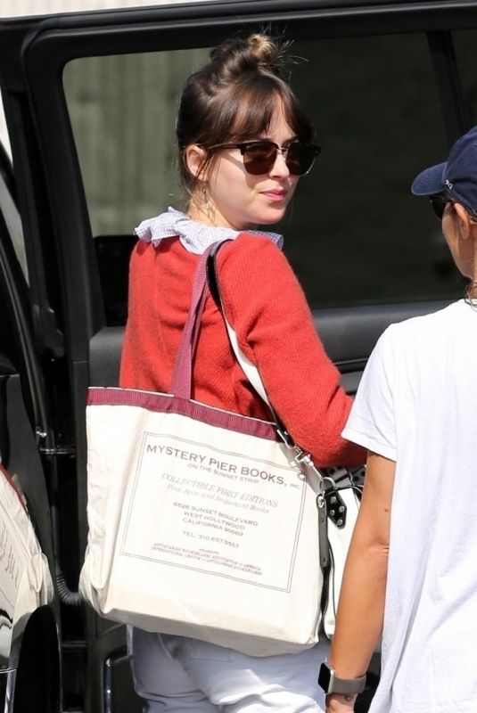 DAKOTA JOHNSON Arrives on the Set of Covers in Hollywood 05/30/2019